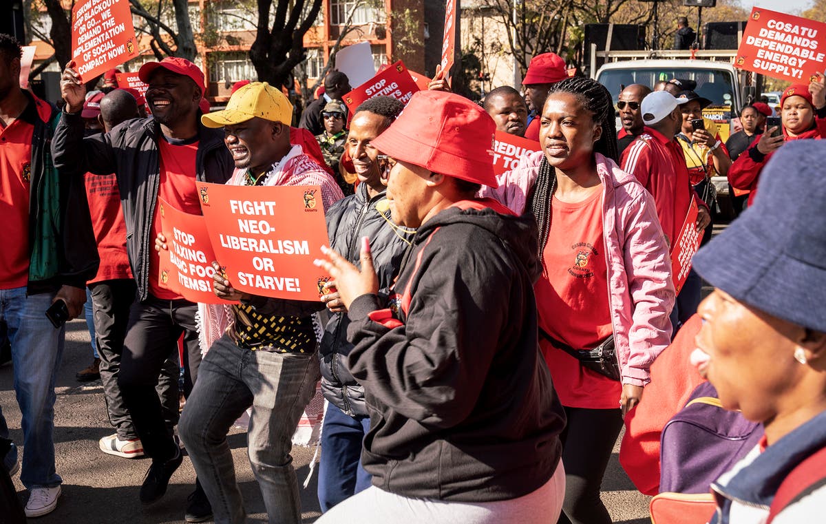 South African workers march in capital against inflation