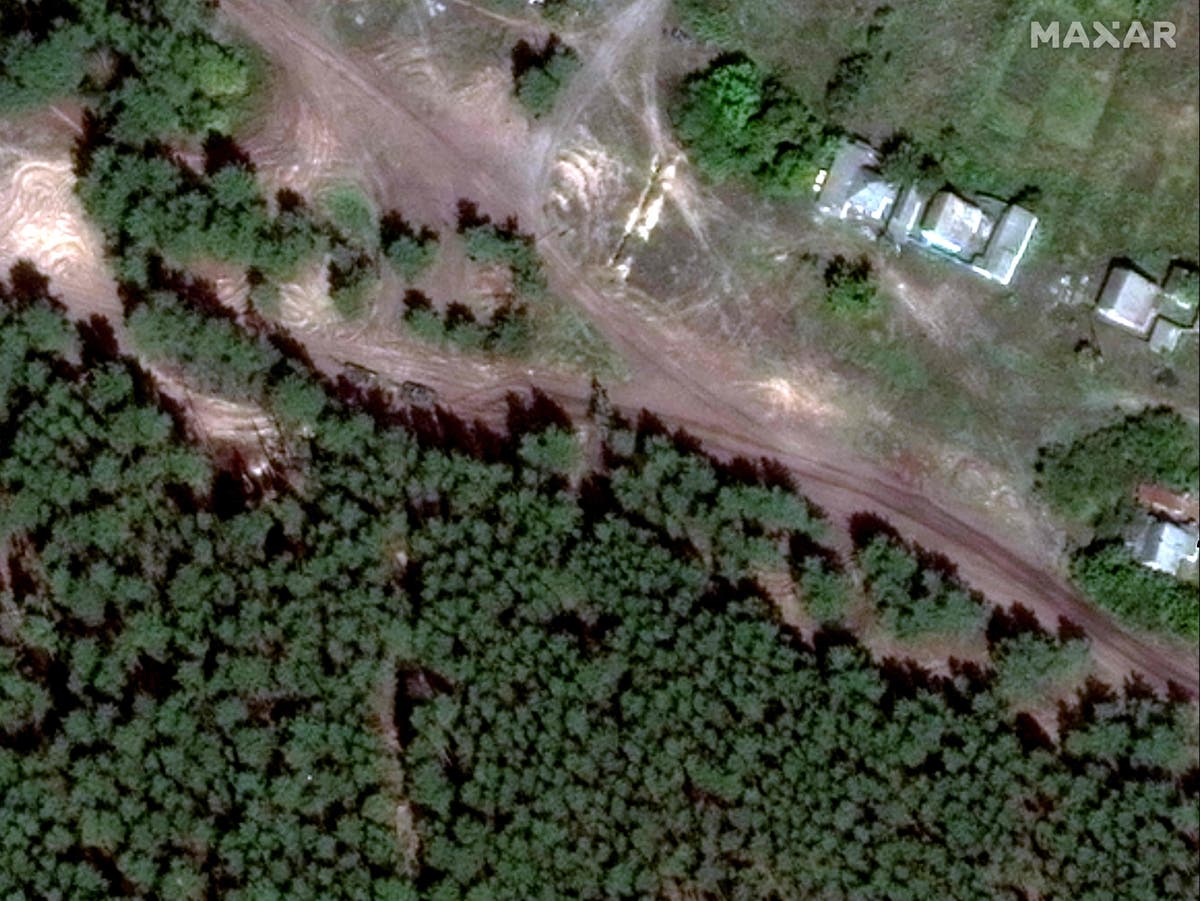 Satellite images show tanks near Izyum mass graves month before bodies found