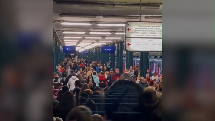 Ukraine: Kyiv residents sing in metro station during Russian air raid | News