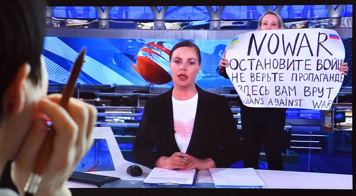 Anti-war Russian reporter who protested live on TV flees house arrest