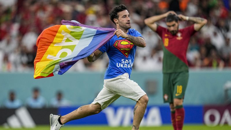 Portugal vs. Uruguay: Pitch invader with rainbow flag interrupts World Cup match