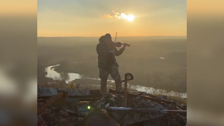 Ukrainian soldier plays violin in reclaimed city in Kharkiv Oblast | News