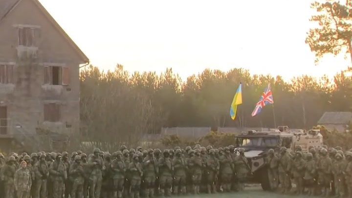 Ukrainian recruits in England stage sunrise parade for war anniversary | News