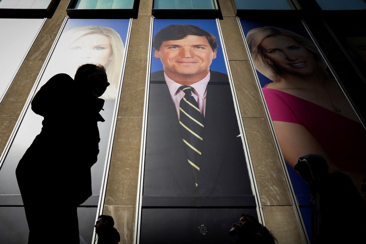 Fox News removes giant poster of Tucker Carlson and other hosts outside of headquarters