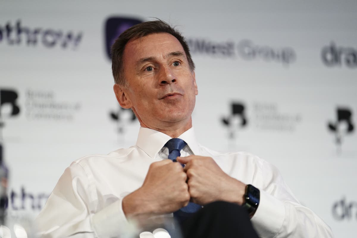 Chancellor urges Tories not to talk the country down as he hints at tax cuts