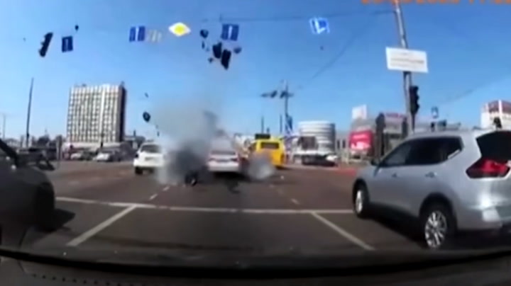 Dashcam footage captures moving car almost hit by missile in Kyiv | News