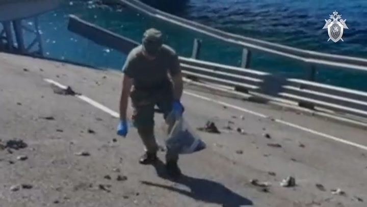 Russian officials clear debris from Crimea bridge after explosions | News