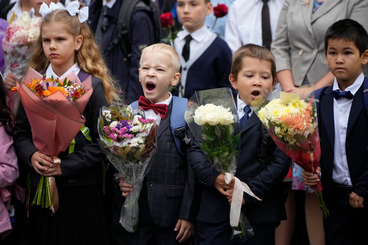 Russian students are returning to school, where they face new lessons to boost their patriotism